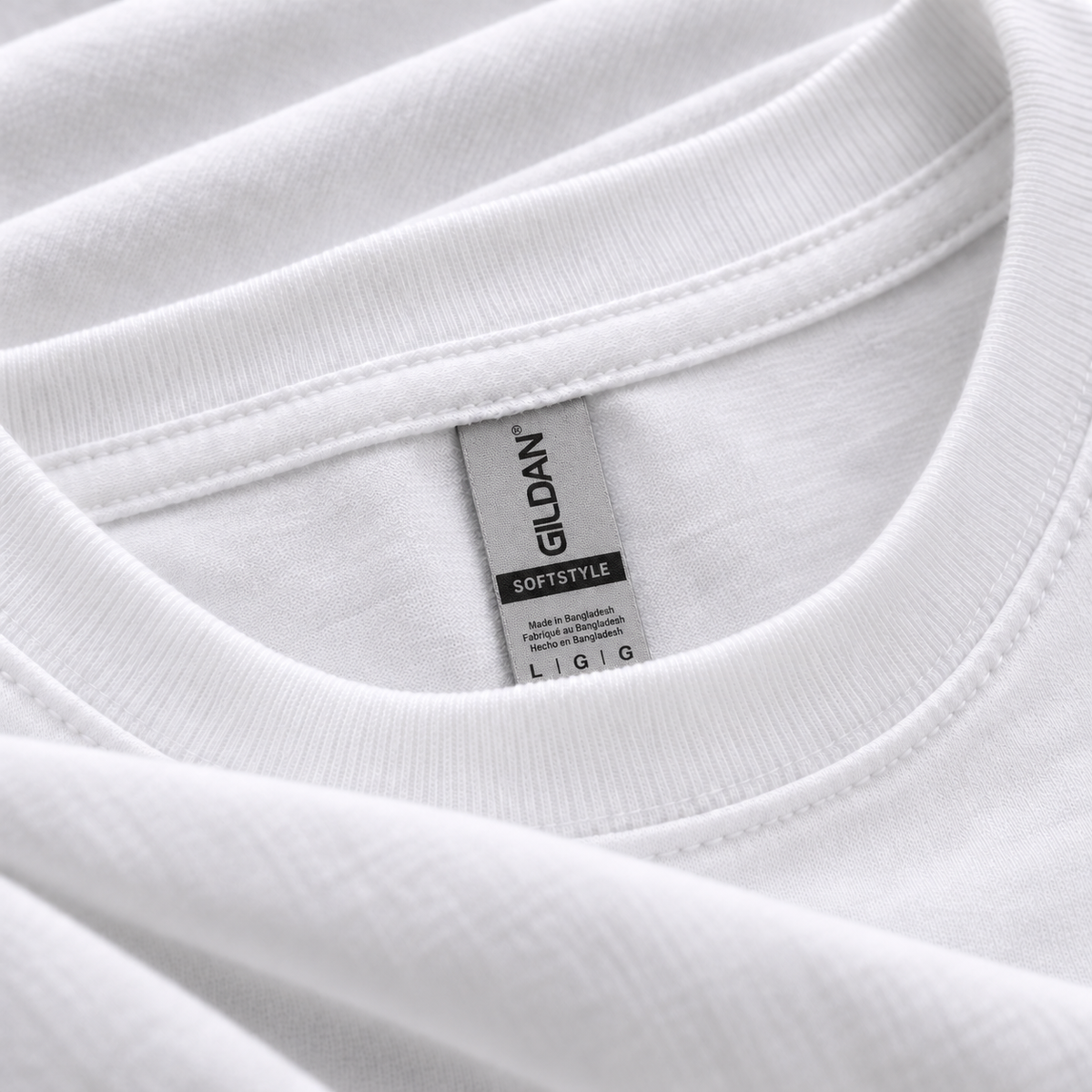 White Gildan Softstyle 64000 T-shirt neckline close-up with gray Gildan Softstyle neck label
