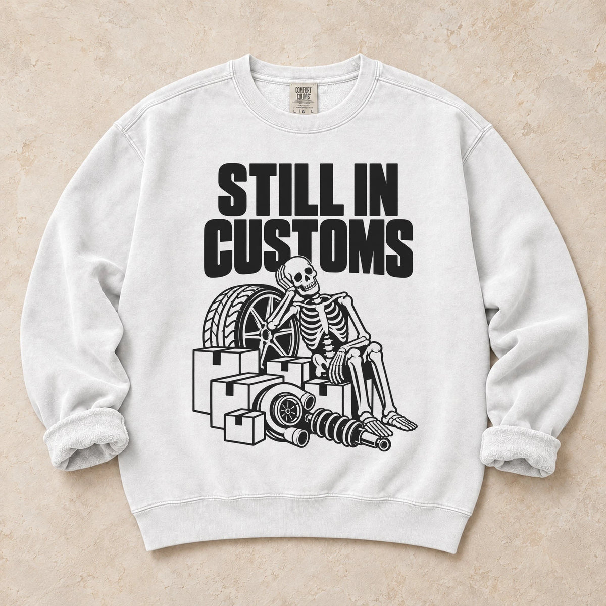 White garment-dyed crewneck sweatshirt with Customs Hold car parts design