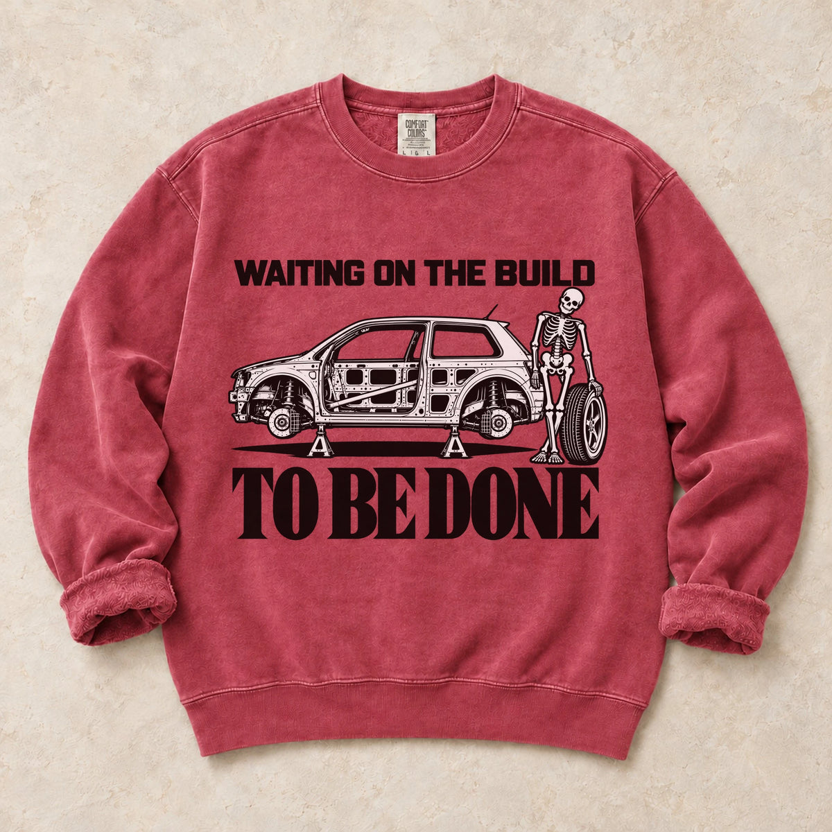 Crimson garment-dyed crewneck sweatshirt with Permanent Project project car design