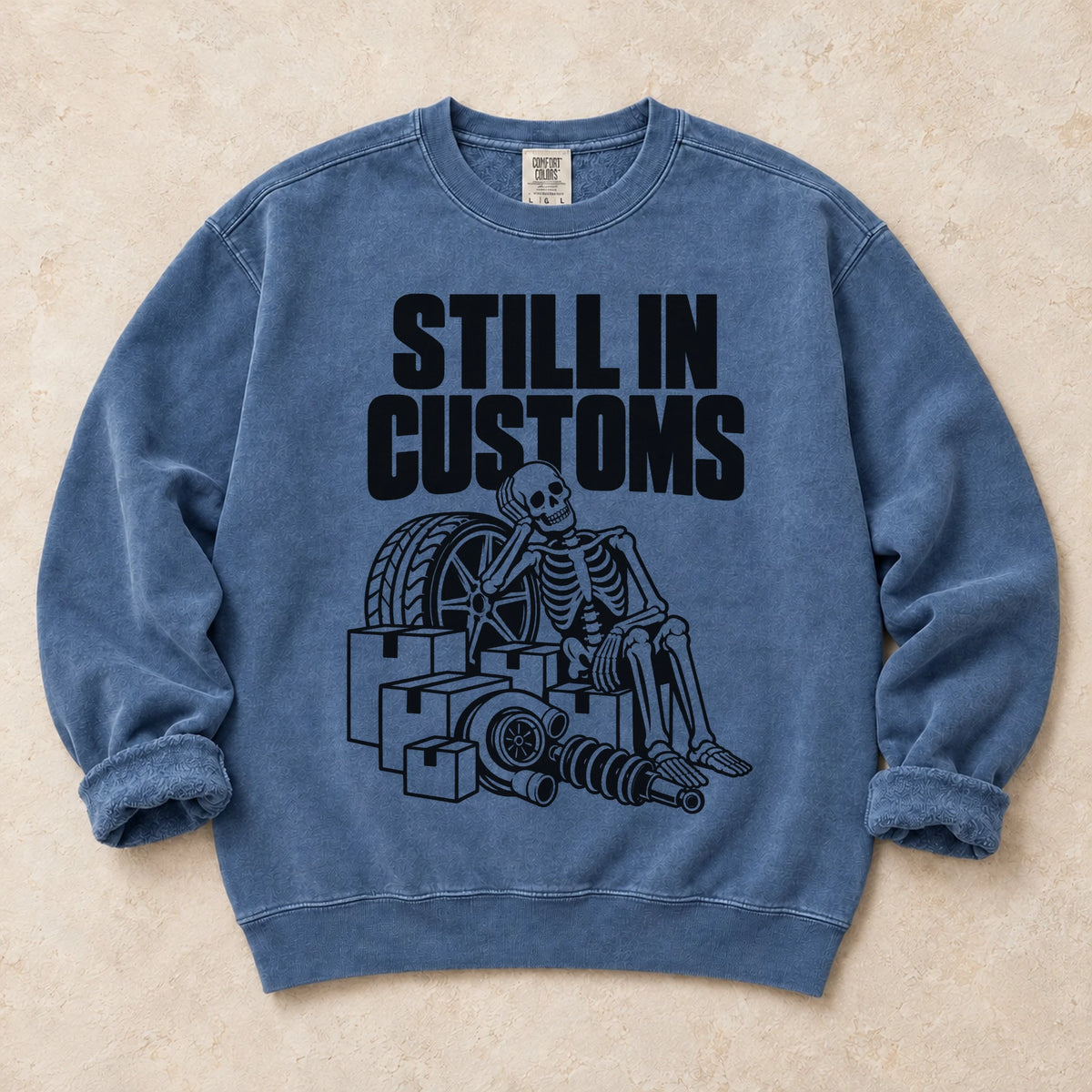 Blue Jean garment-dyed crewneck sweatshirt with Customs Hold car parts design