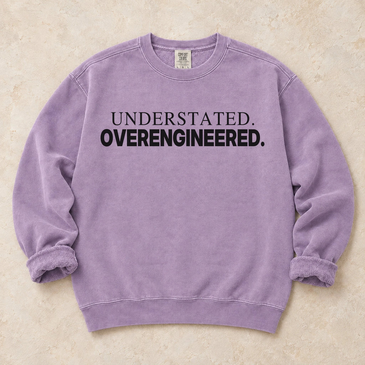 Orchid garment-dyed crewneck sweatshirt with Quiet Overkill car enthusiast design