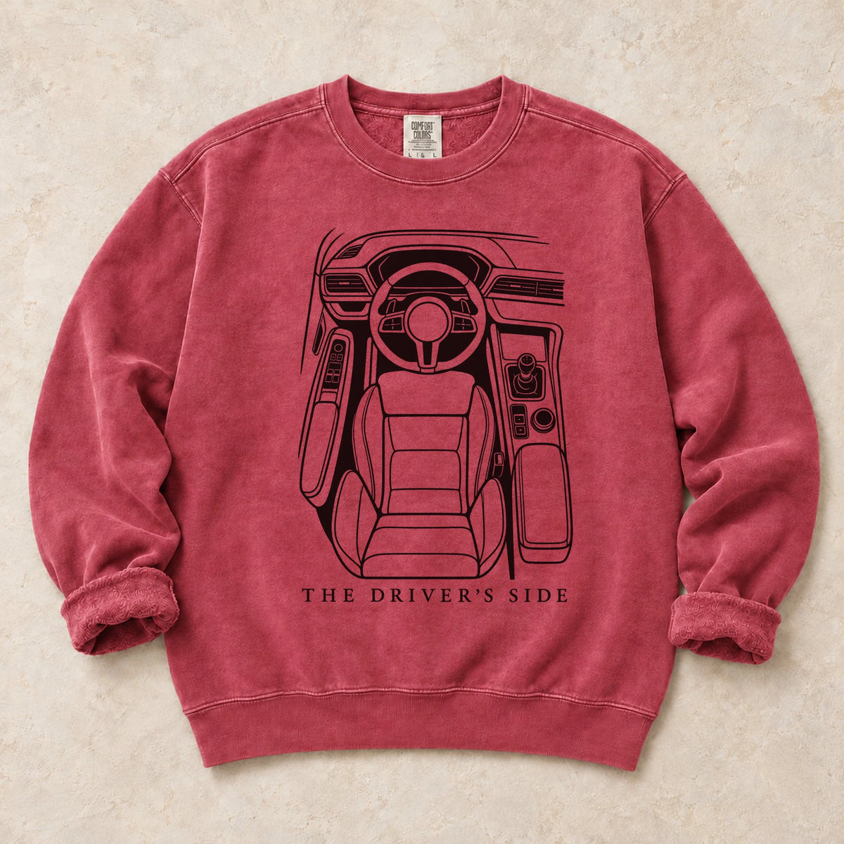 Crimson garment-dyed crewneck sweatshirt with Cockpit Command driver humor design