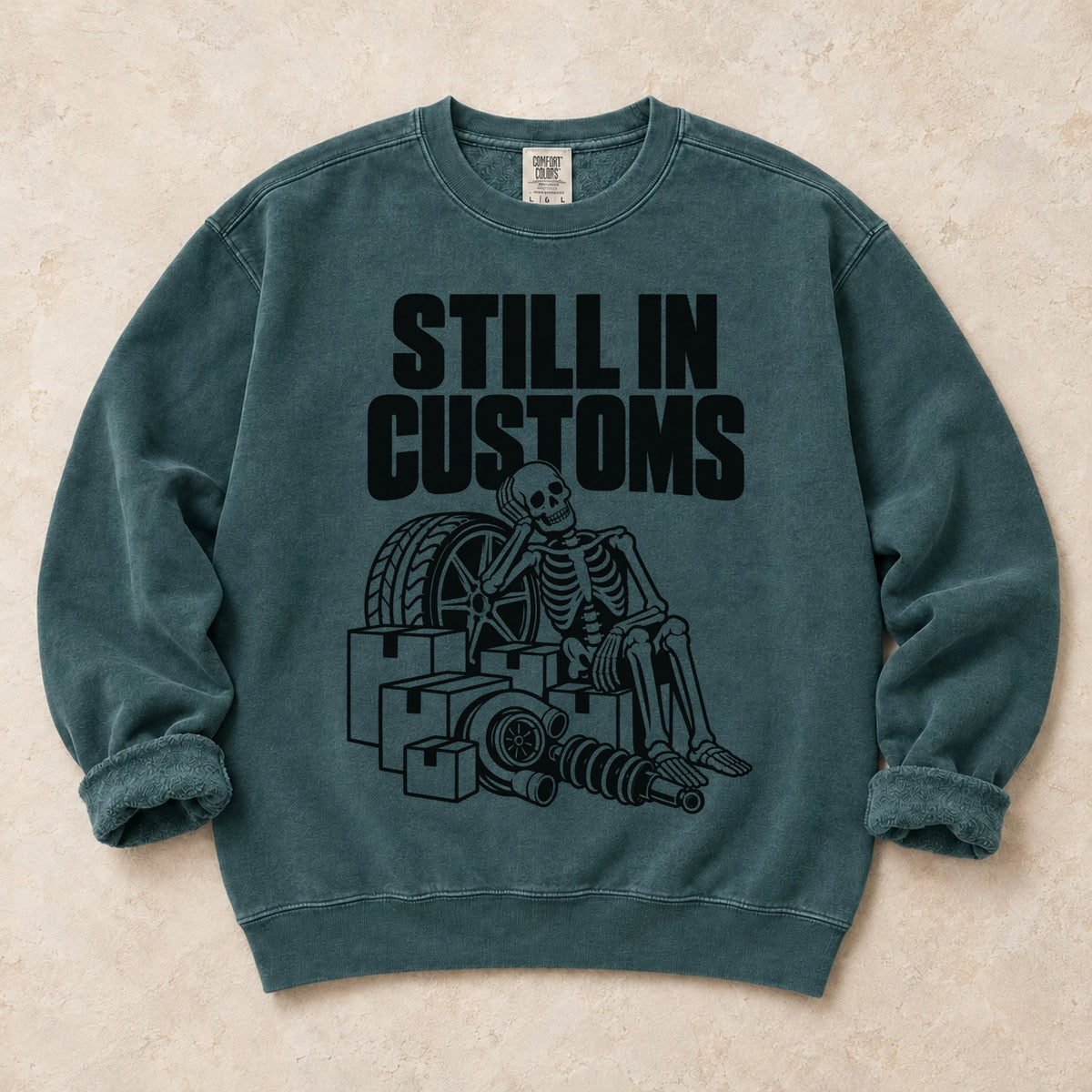 Blue Spruce garment-dyed crewneck sweatshirt with Customs Hold car parts design