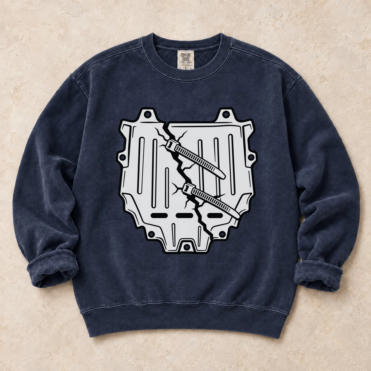 True Navy garment-dyed crewneck sweatshirt with Housing Crisis car repair design