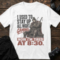 White gaming T-shirt. A sleepy knight used to game all night, now tired at 8:30.
