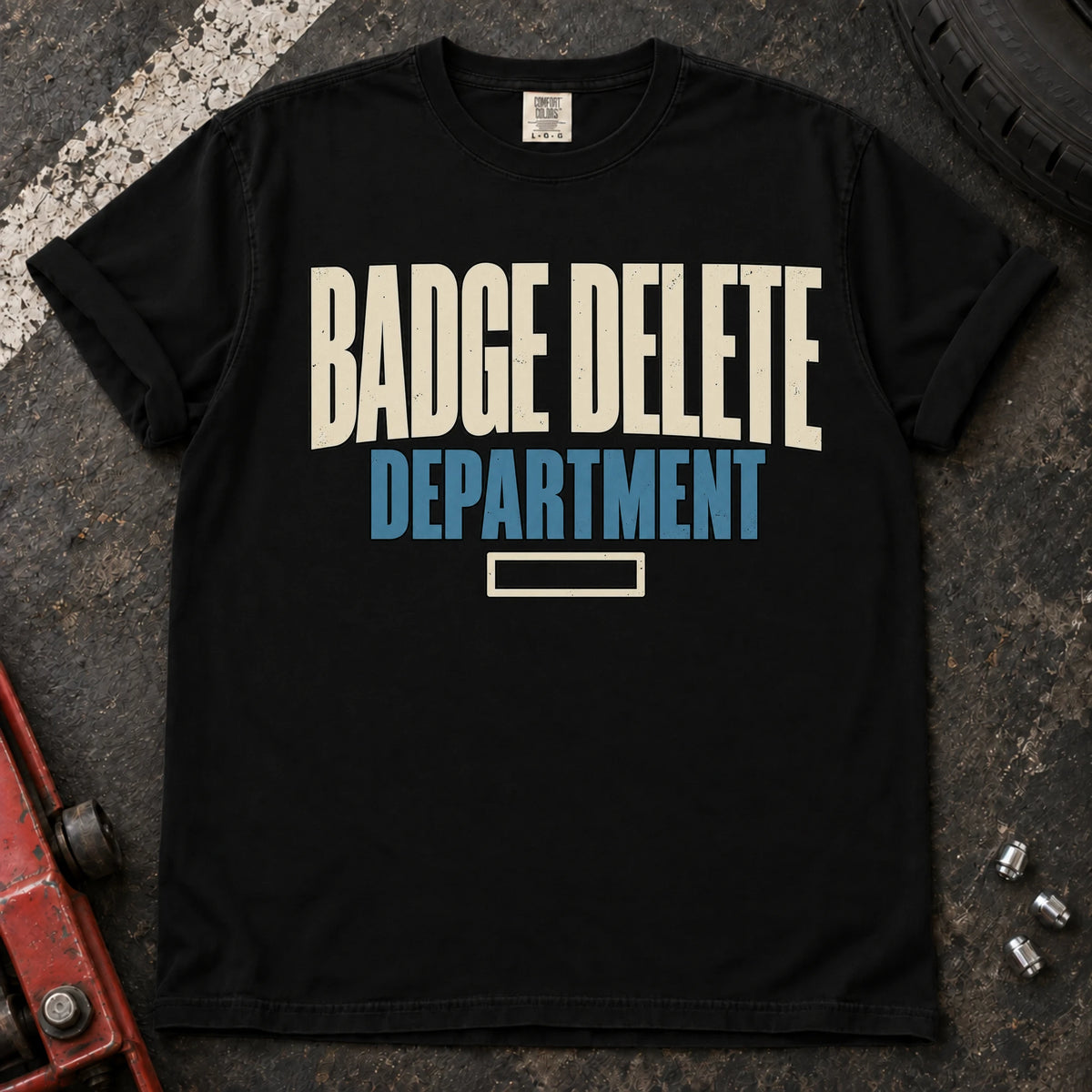 Black car enthusiast T-shirt. Badge Delete Department, with a small empty badge outline.