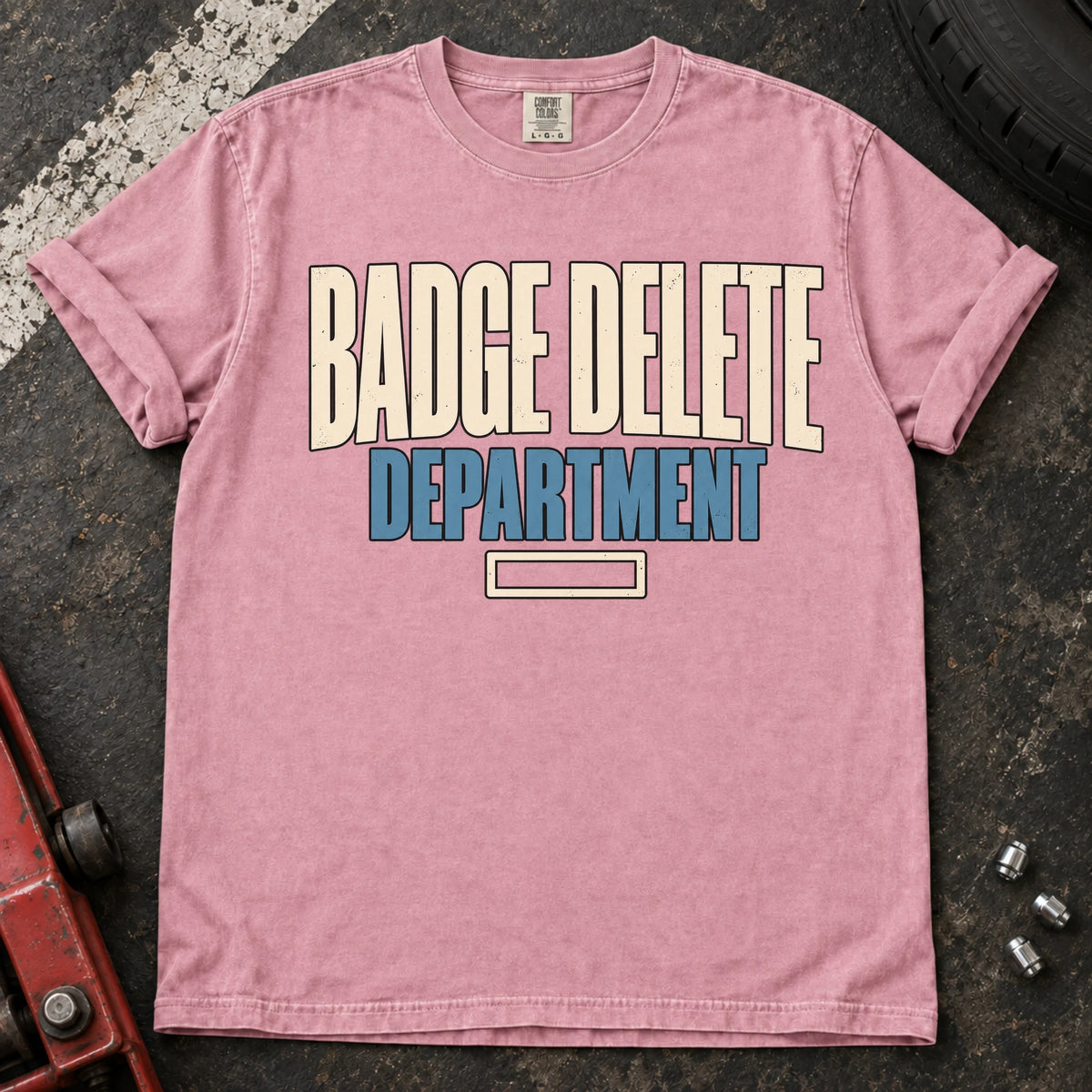 Blossom car enthusiast T-shirt. Badge Delete Department, with a small empty badge outline.