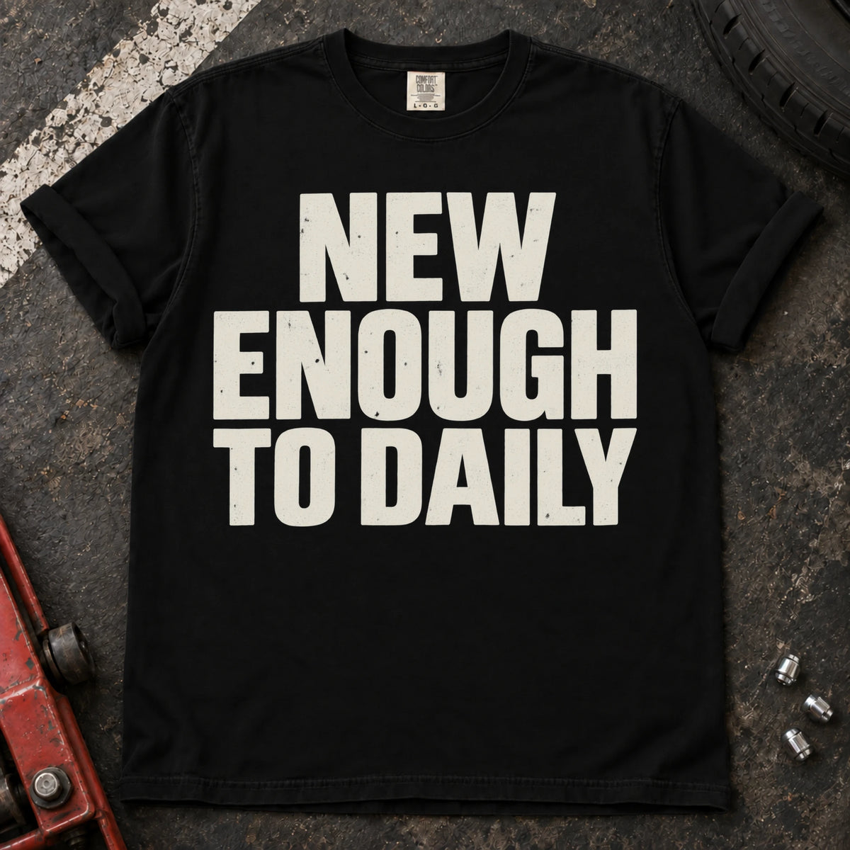 Black car enthusiast T-shirt. New enough to daily: simple typography for the everyday enthusiast car.