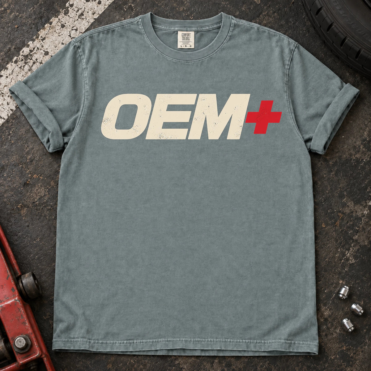 Bay car enthusiast T-shirt. OEM+ lettering keeps the factory-plus philosophy simple.