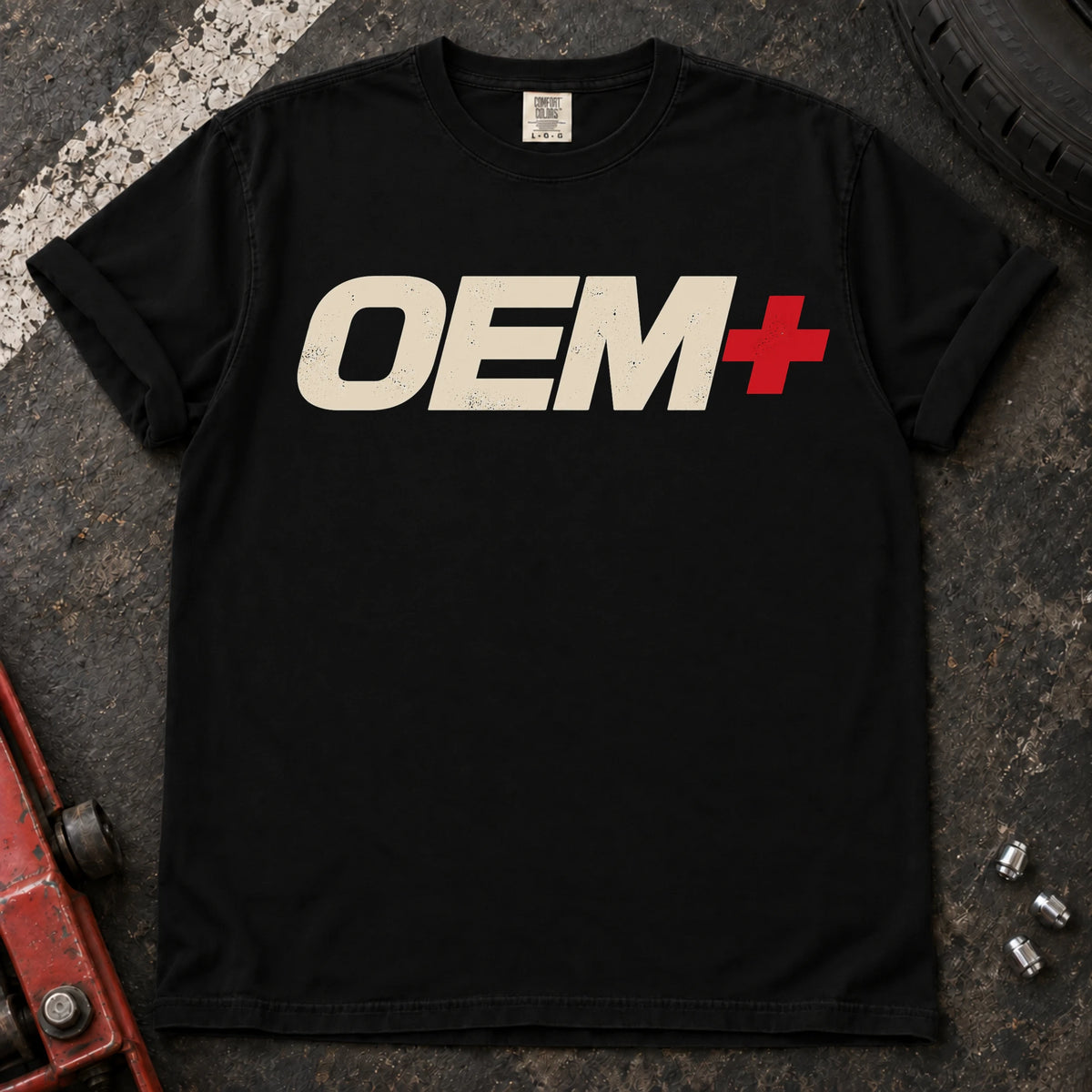 Black car enthusiast T-shirt. OEM+ lettering keeps the factory-plus philosophy simple.