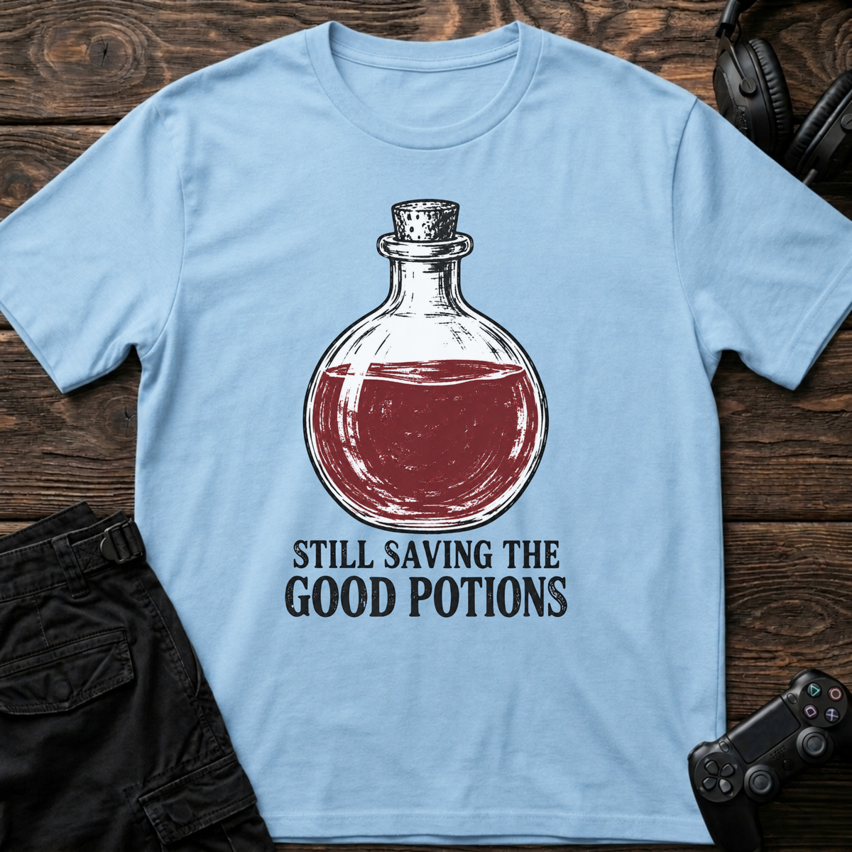 Light Blue gaming T-shirt. A full red potion is still being saved for the perfect moment.