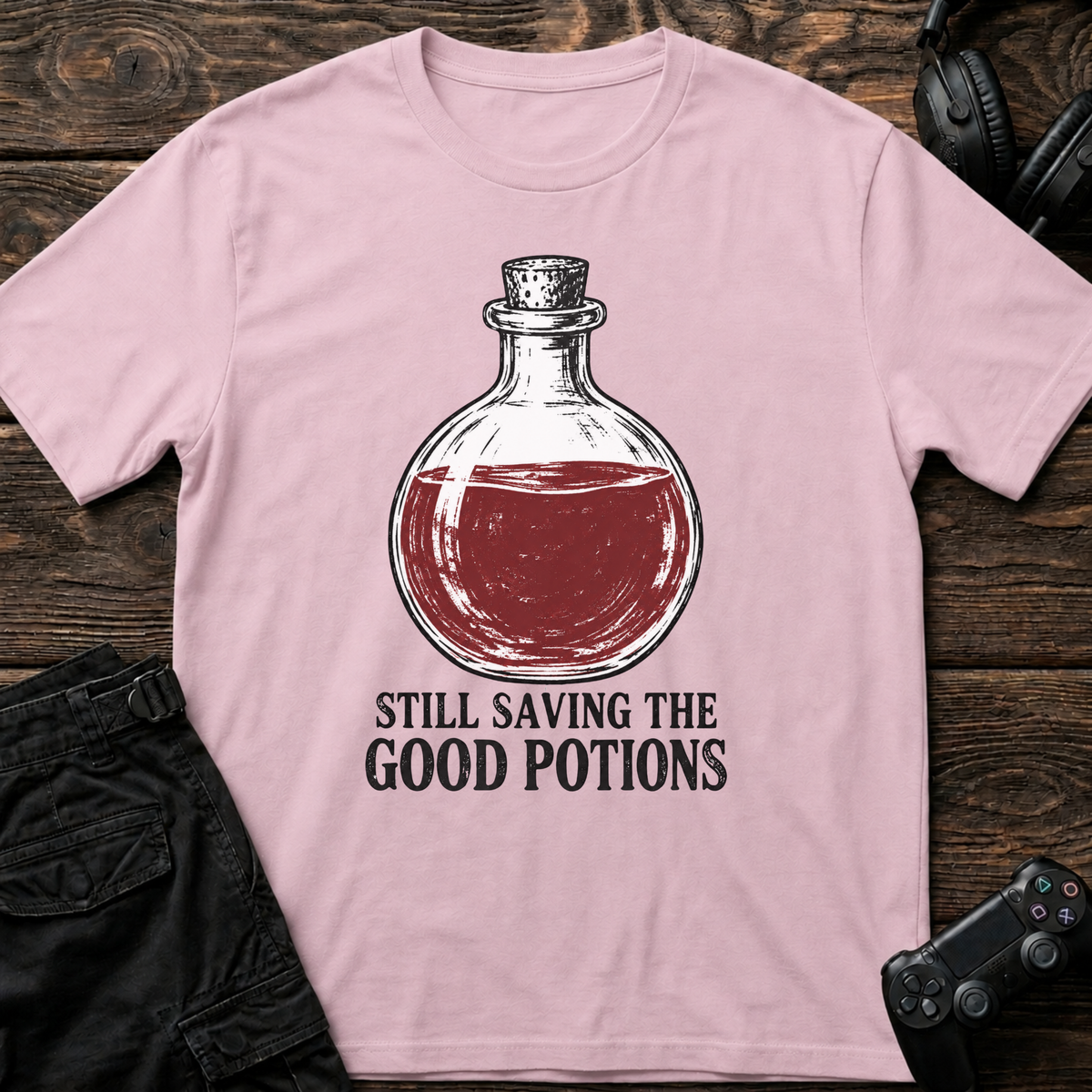 Light Pink gaming T-shirt. A full red potion is still being saved for the perfect moment.