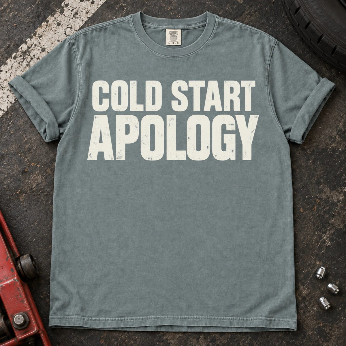 Bay car enthusiast T-shirt. Cold start apology, in bold understated automotive lettering.
