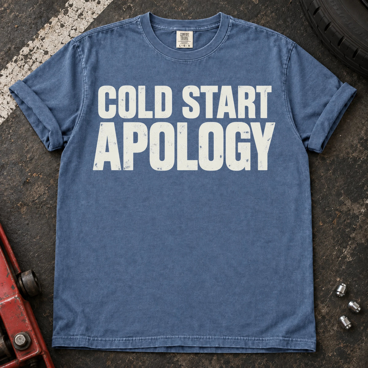 Blue Jean car enthusiast T-shirt. Cold start apology, in bold understated automotive lettering.