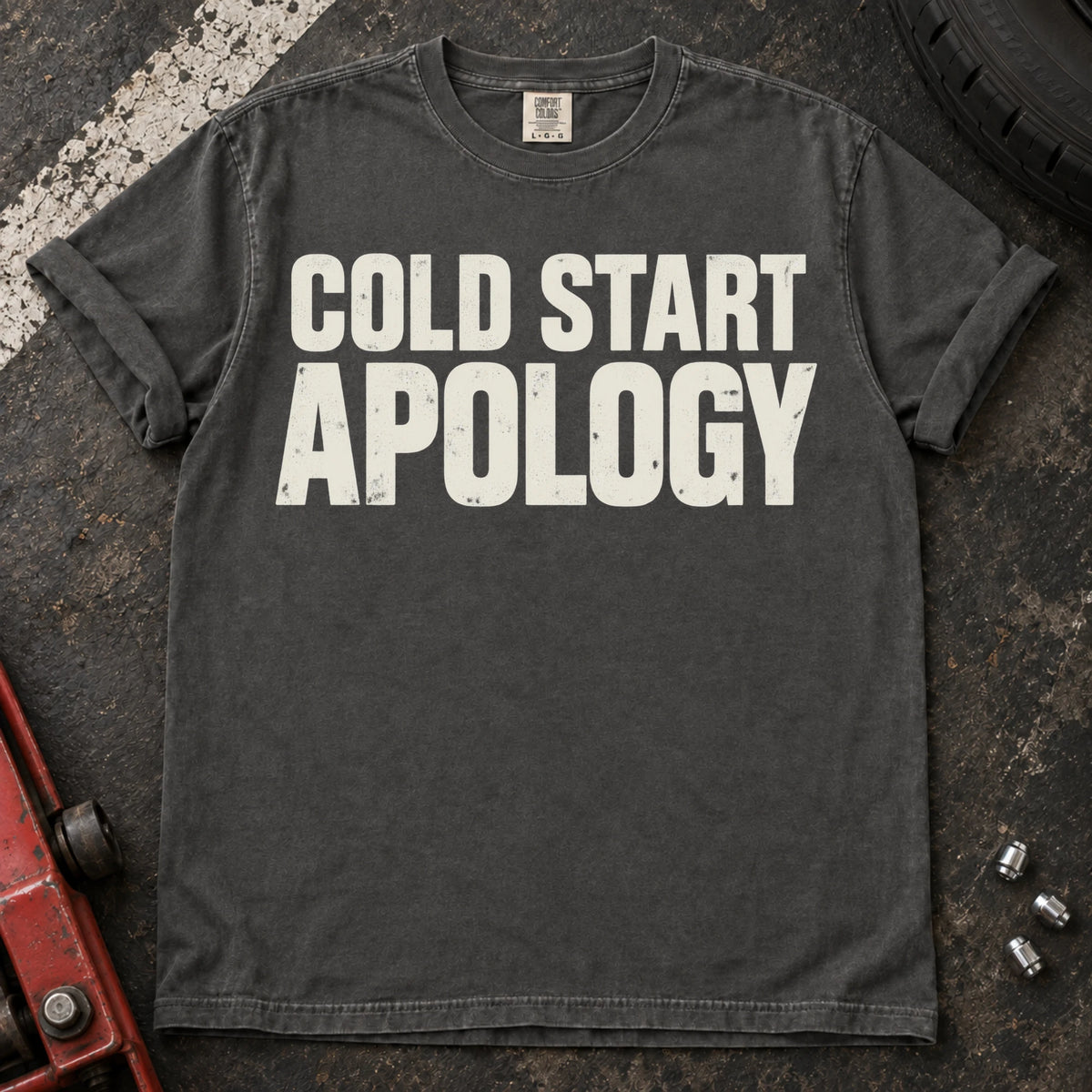 Pepper car enthusiast T-shirt. Cold start apology, in bold understated automotive lettering.