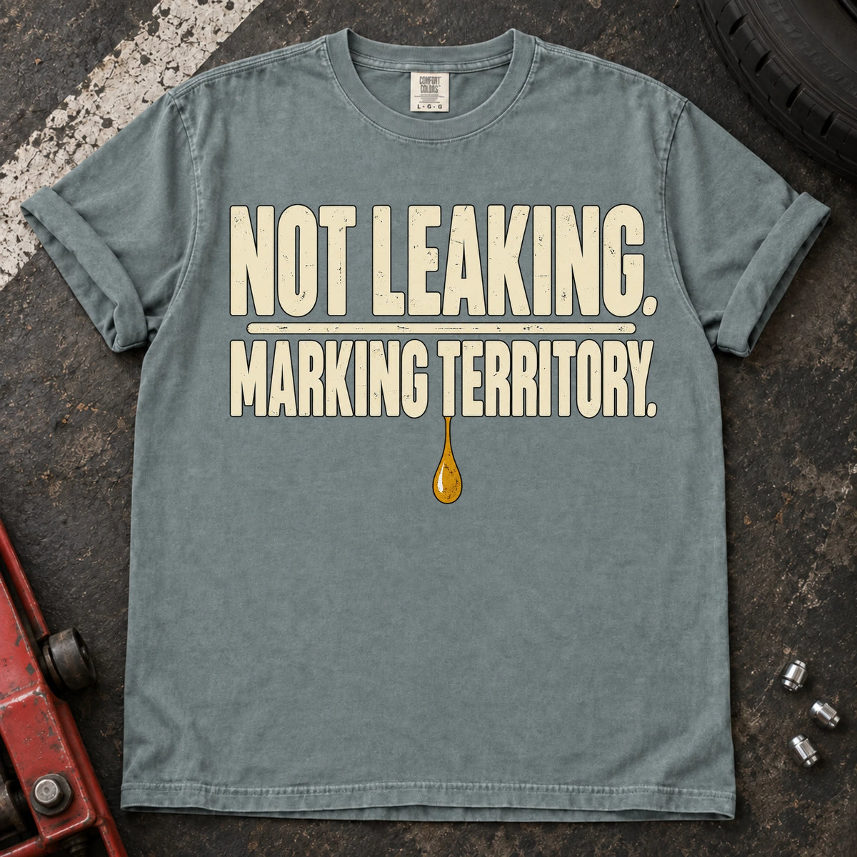 Bay car enthusiast T-shirt. An oil drop backs not leaking, marking territory.