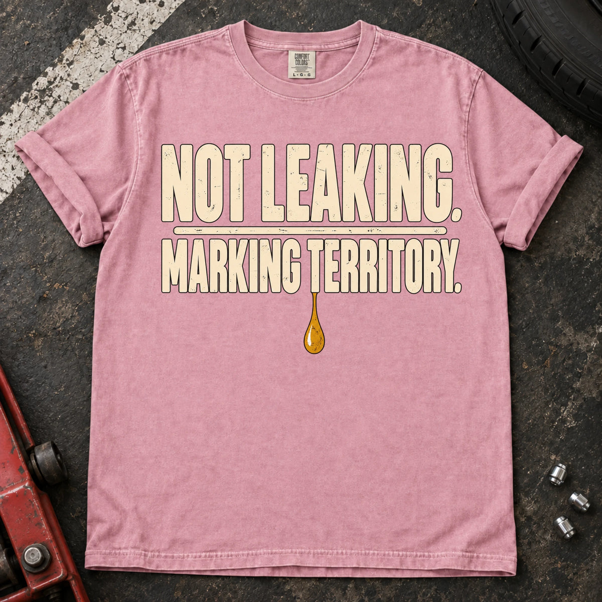 Blossom car enthusiast T-shirt. An oil drop backs not leaking, marking territory.