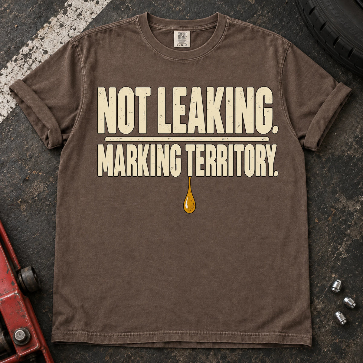 Espresso car enthusiast T-shirt. An oil drop backs not leaking, marking territory.