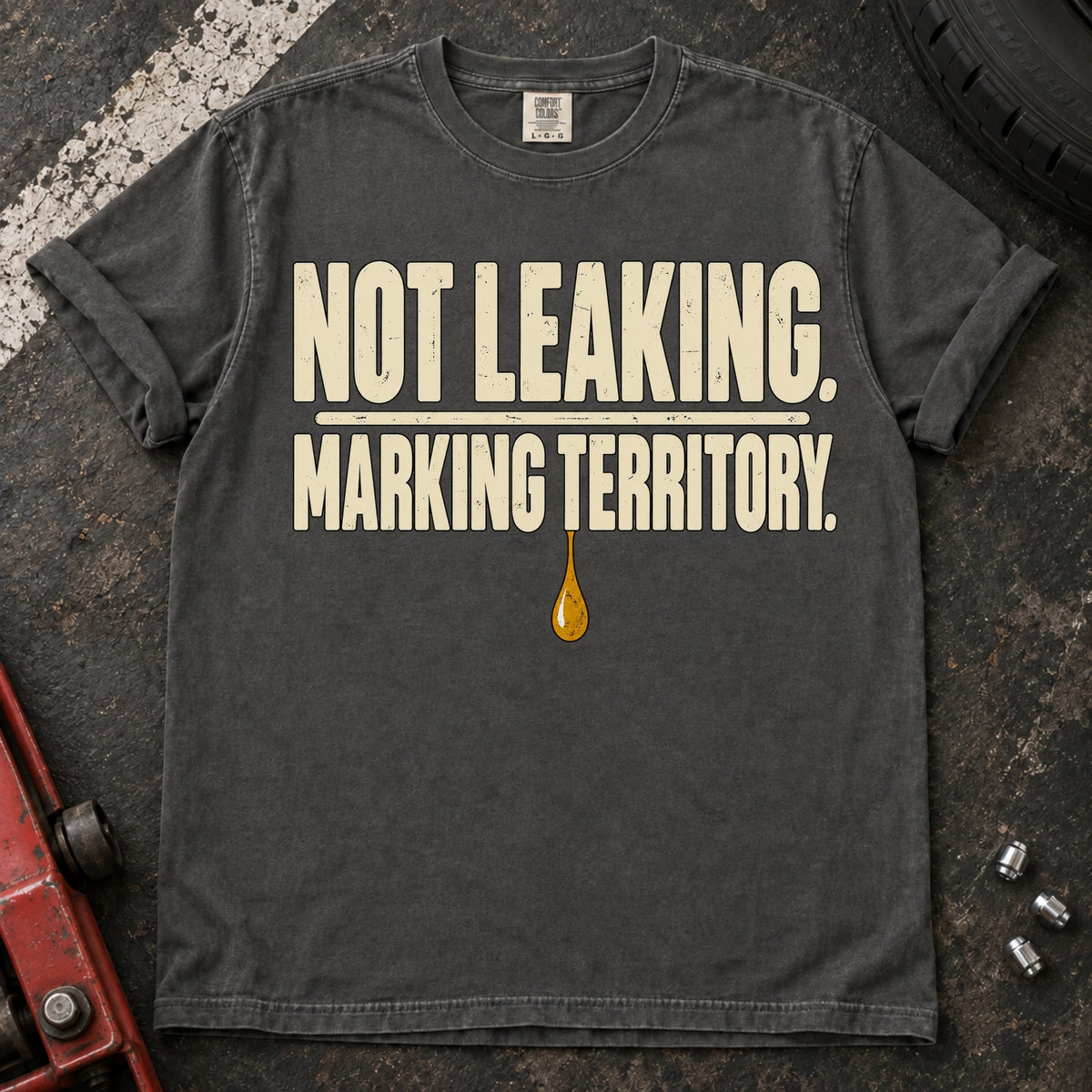Pepper car enthusiast T-shirt. An oil drop backs not leaking, marking territory.