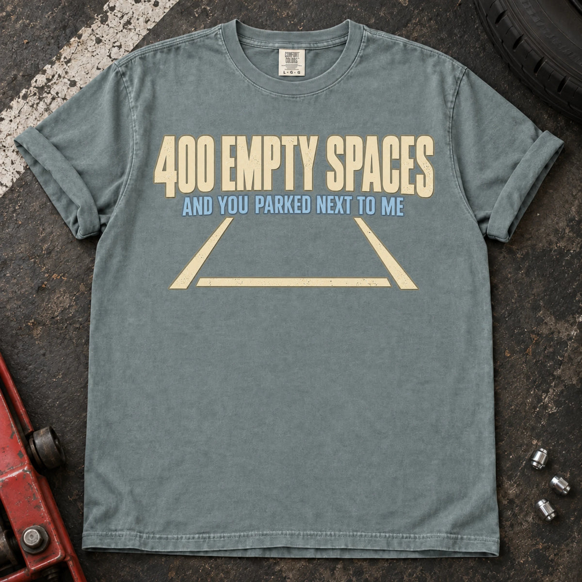 Bay car enthusiast T-shirt. An empty parking bay asks why someone parked beside you among 400 spaces.