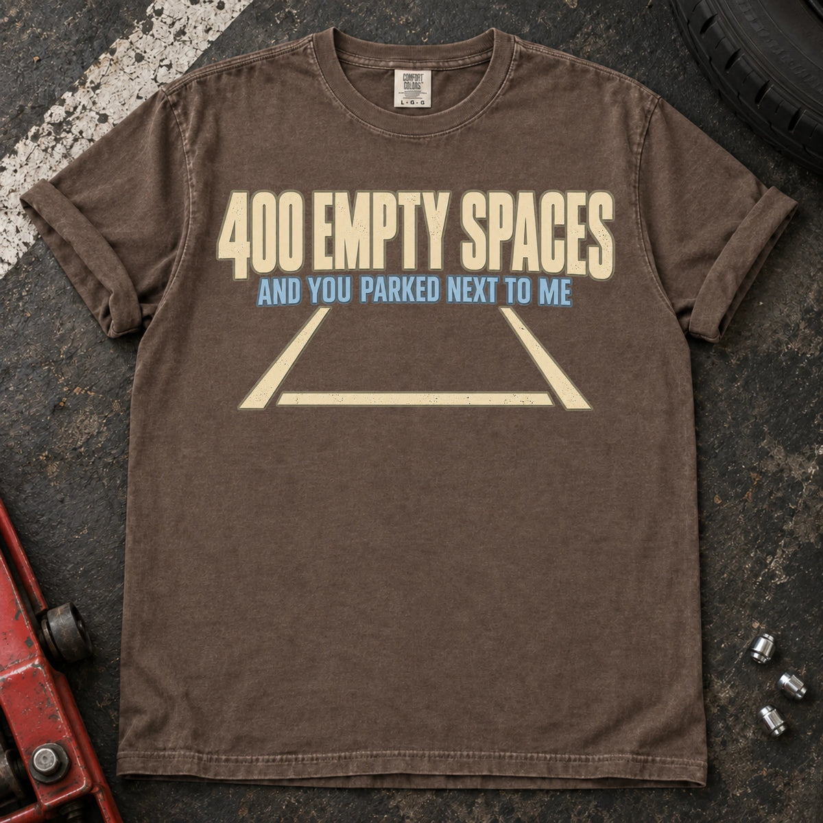 Espresso car enthusiast T-shirt. An empty parking bay asks why someone parked beside you among 400 spaces.