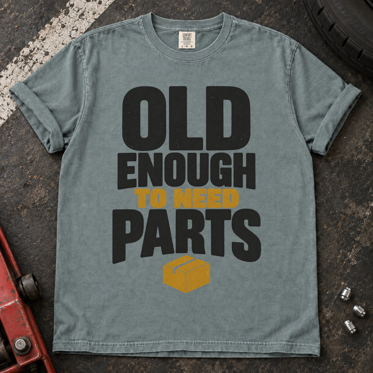 Bay car enthusiast T-shirt. A parts box illustrates being old enough to need parts.