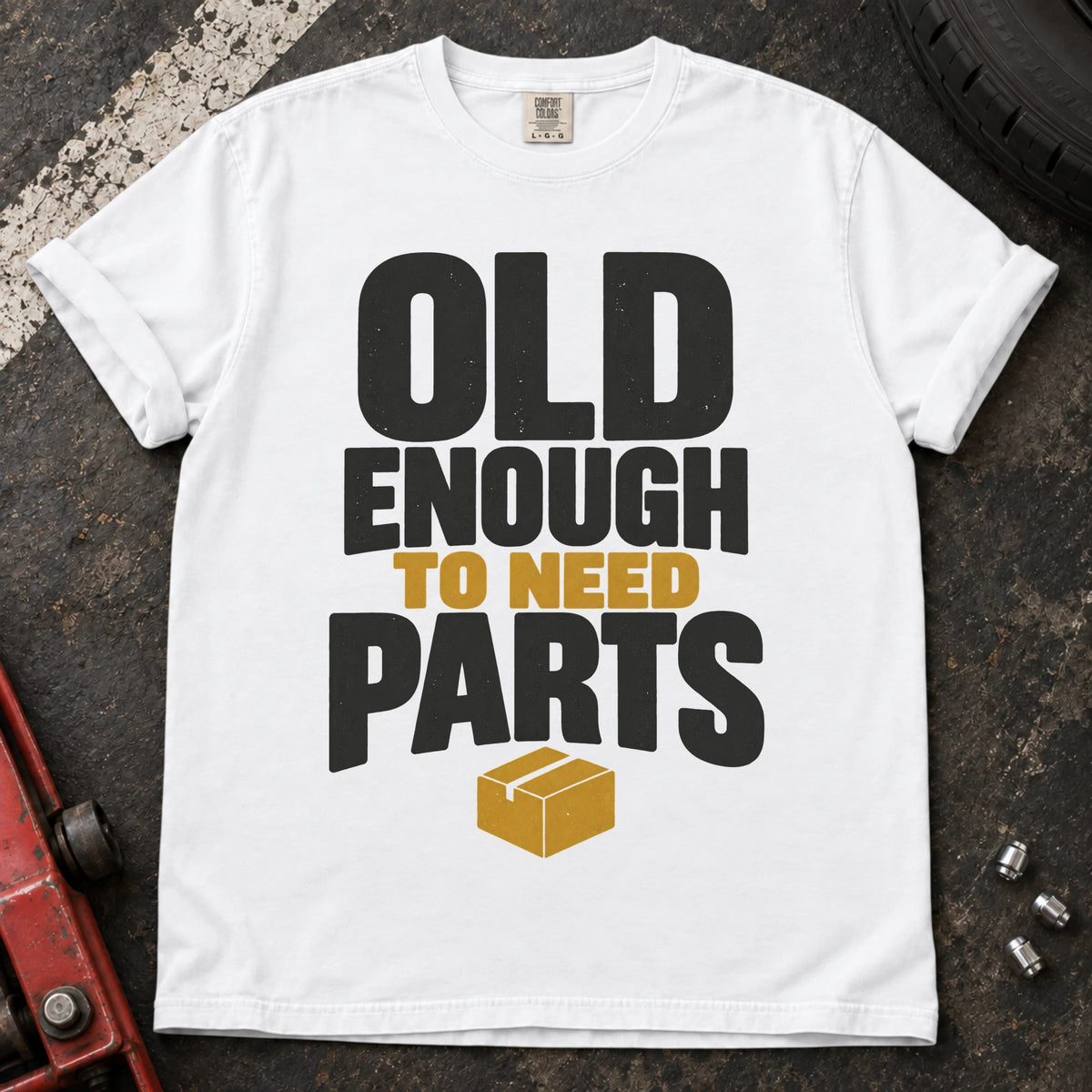 White car enthusiast T-shirt. A parts box illustrates being old enough to need parts.