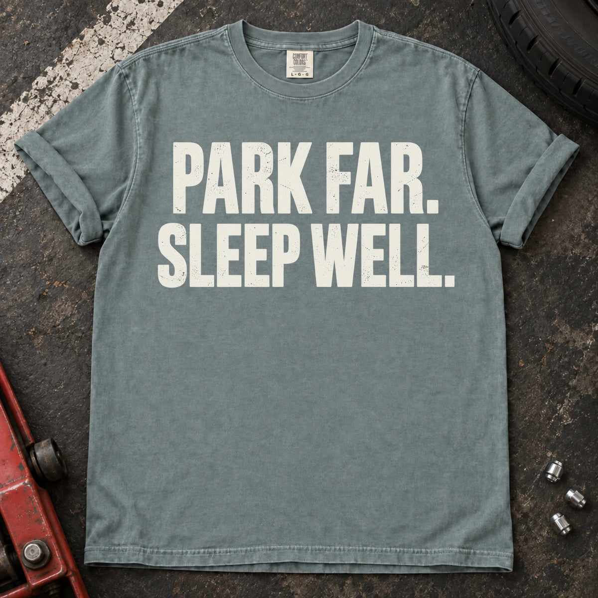 Bay car enthusiast T-shirt. Park far, sleep well: a simple motto for careful car owners.