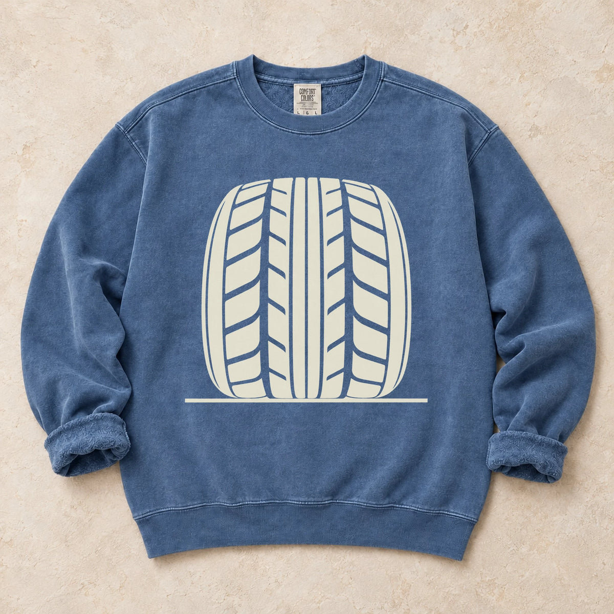 Blue Jean garment-dyed crewneck sweatshirt with Tread Theory tire enthusiast design