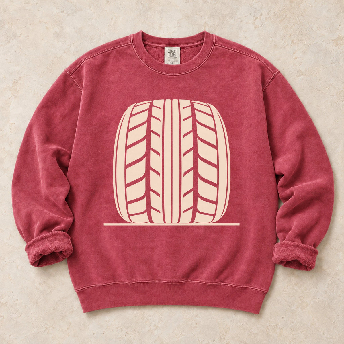 Crimson garment-dyed crewneck sweatshirt with Tread Theory tire enthusiast design