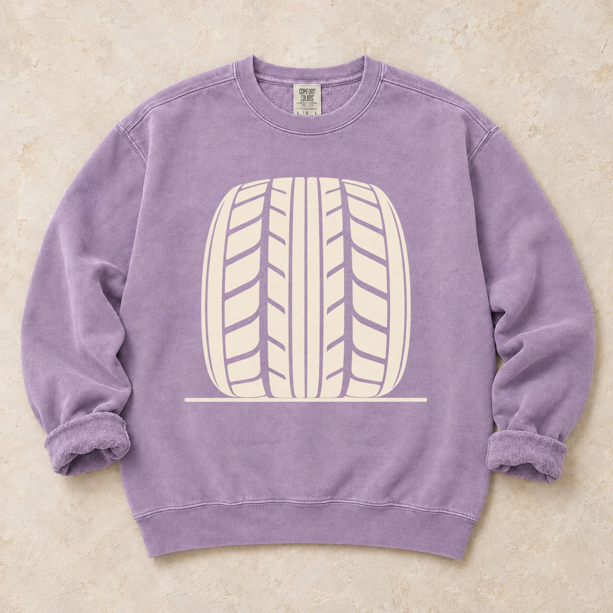 Orchid garment-dyed crewneck sweatshirt with Tread Theory tire enthusiast design