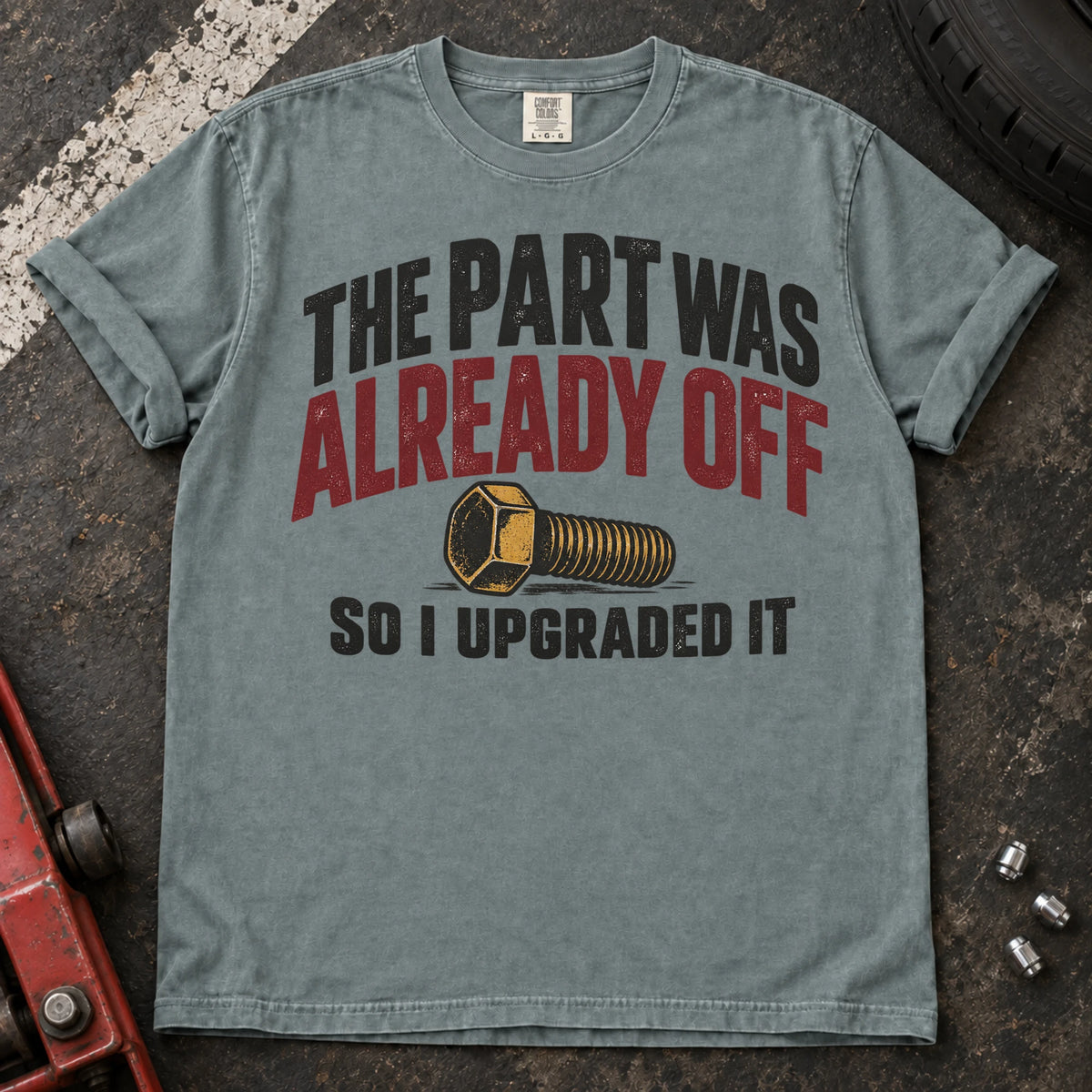 Bay car enthusiast T-shirt. A bolt explains the part was already off, so I upgraded it.
