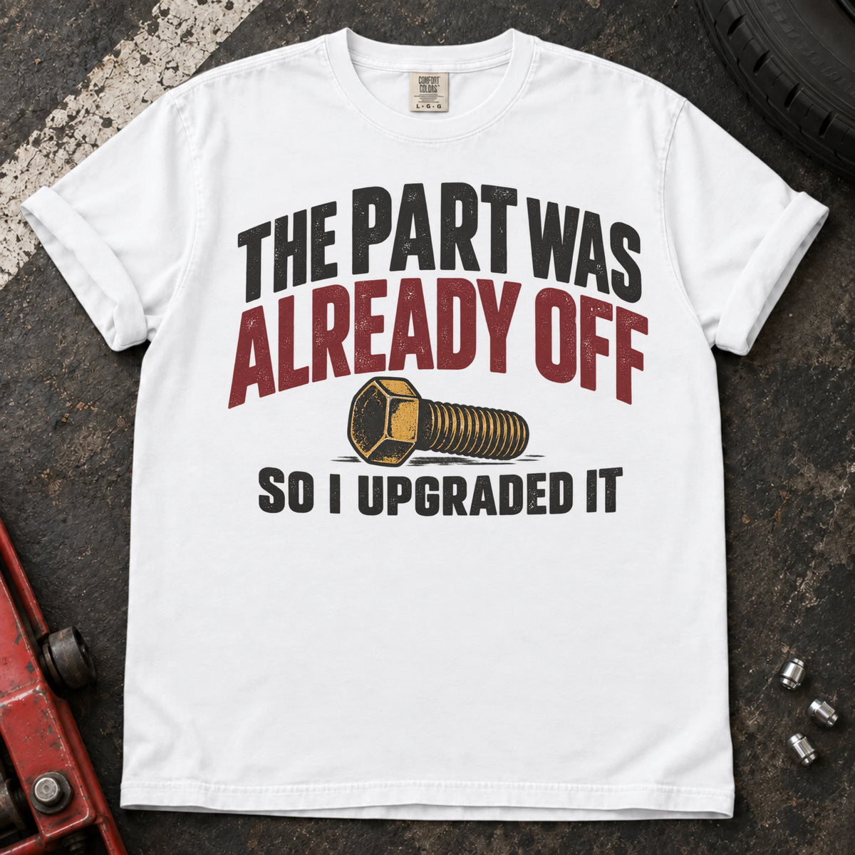 White car enthusiast T-shirt. A bolt explains the part was already off, so I upgraded it.