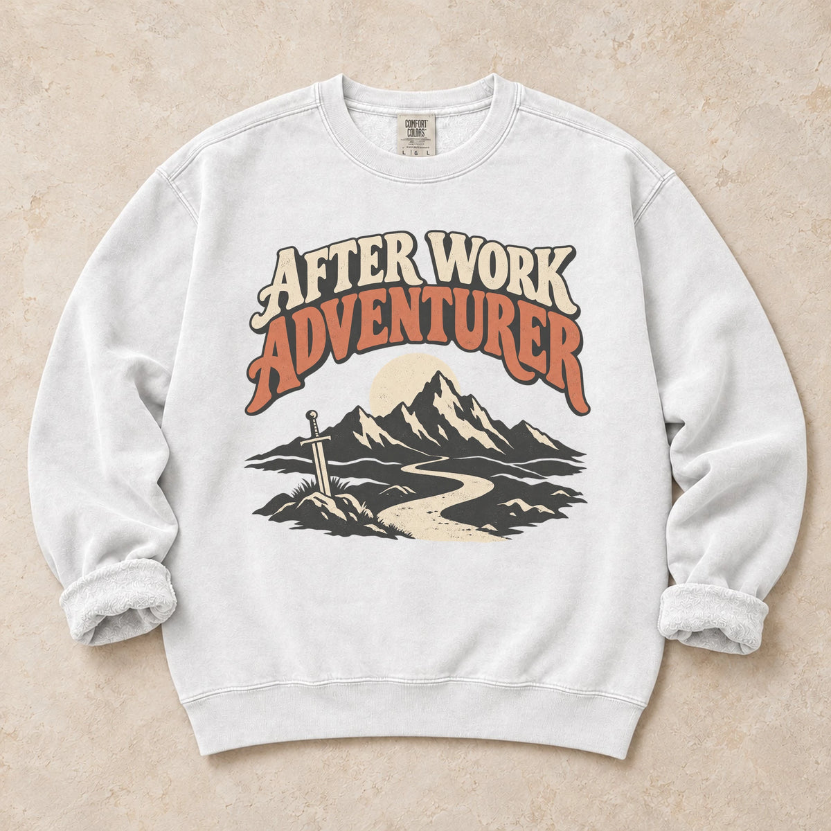 White gaming sweatshirt. An after-work adventurer follows a mountain trail toward a planted sword.