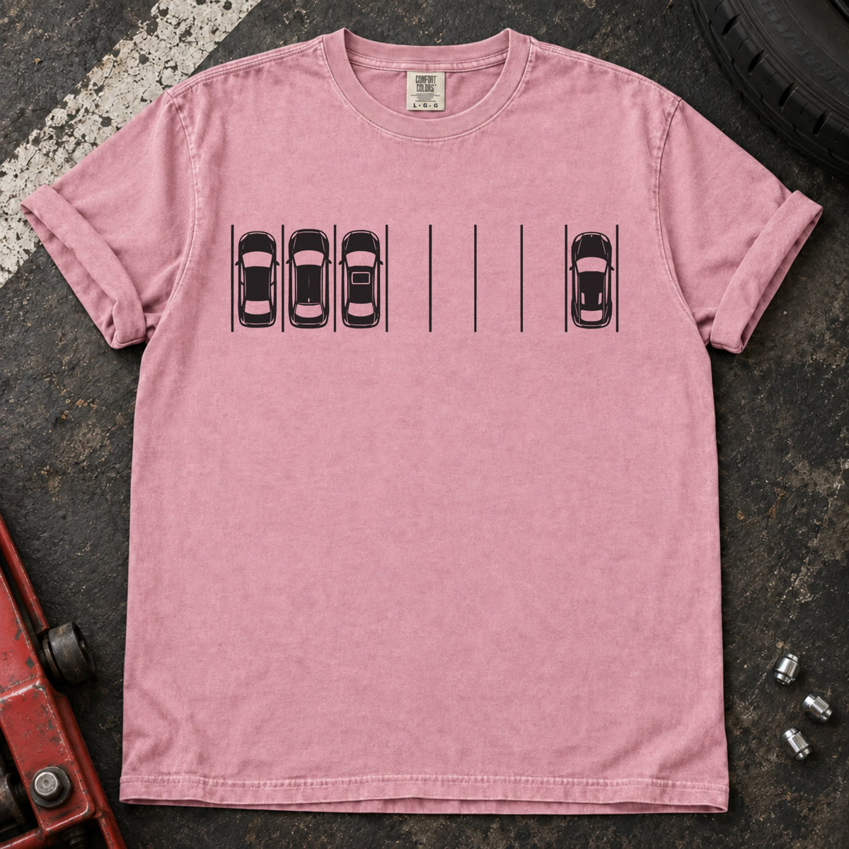 Blossom T-shirt with a minimal overhead parking diagram showing one car parked away from three others.