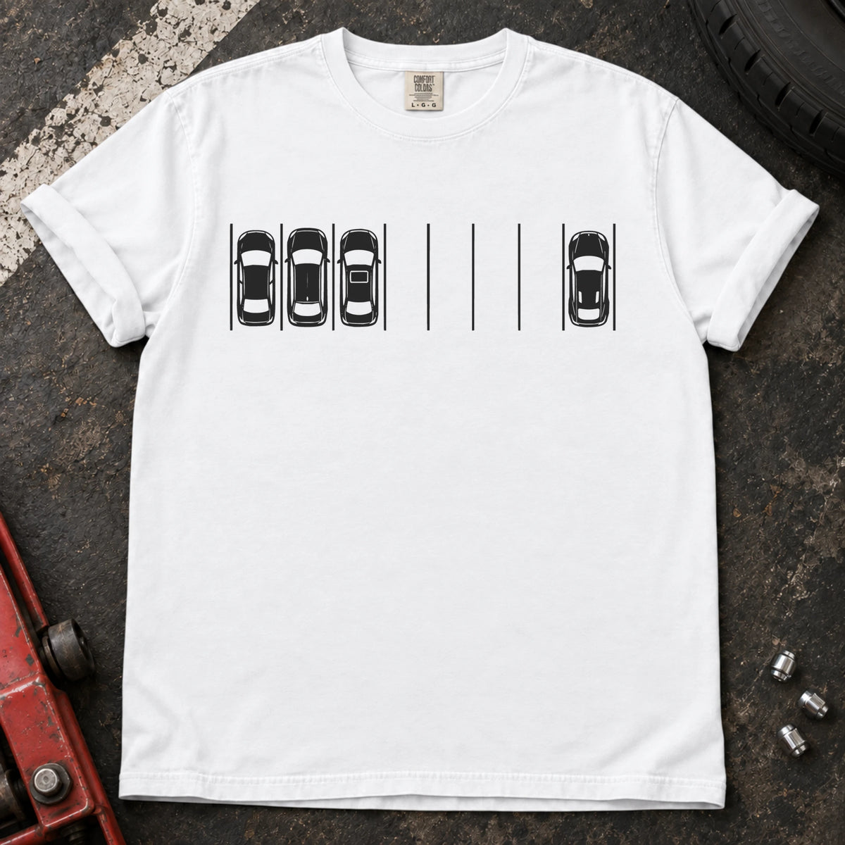 White T-shirt with a minimal overhead parking diagram showing one car parked away from three others.