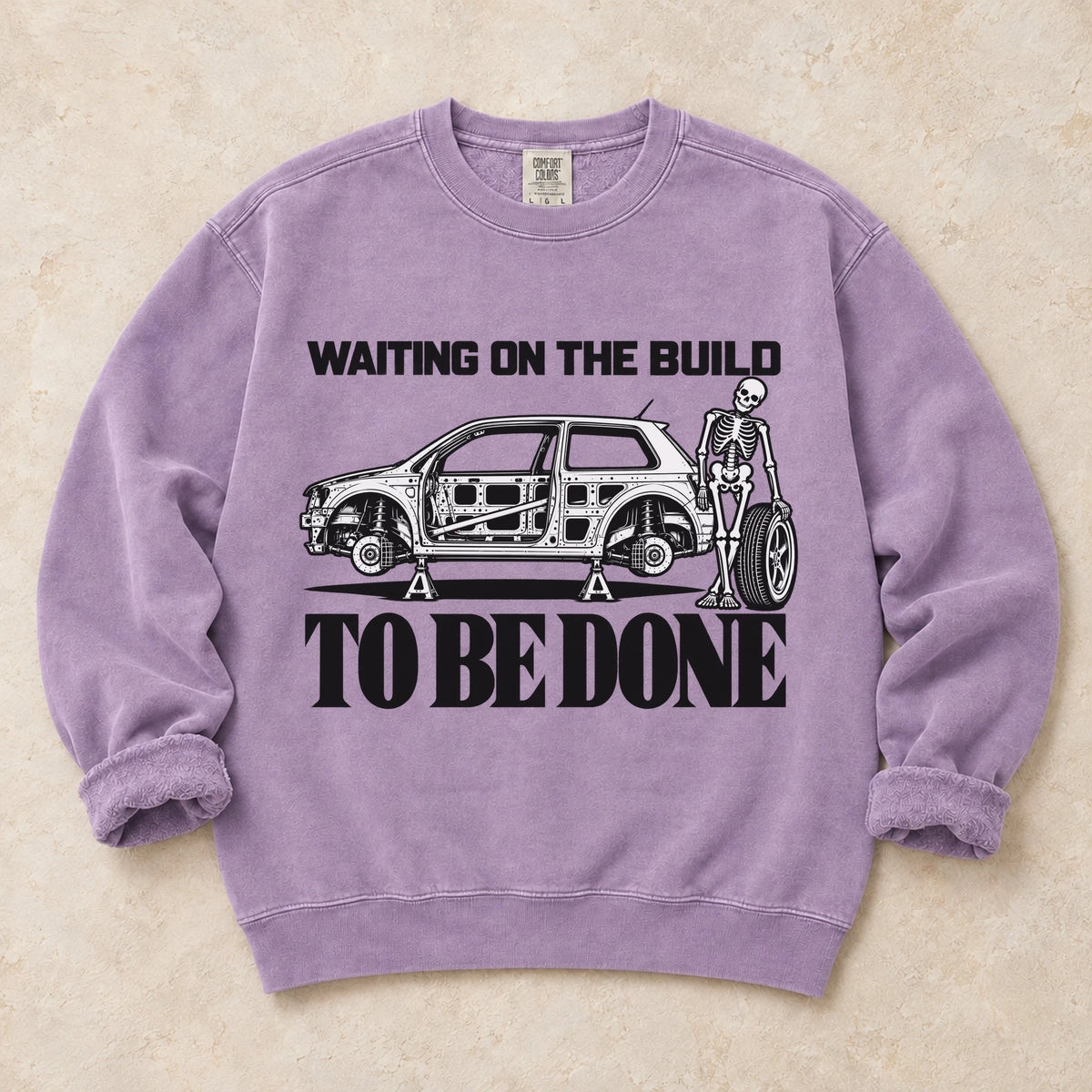 Orchid garment-dyed crewneck sweatshirt with Permanent Project project car design
