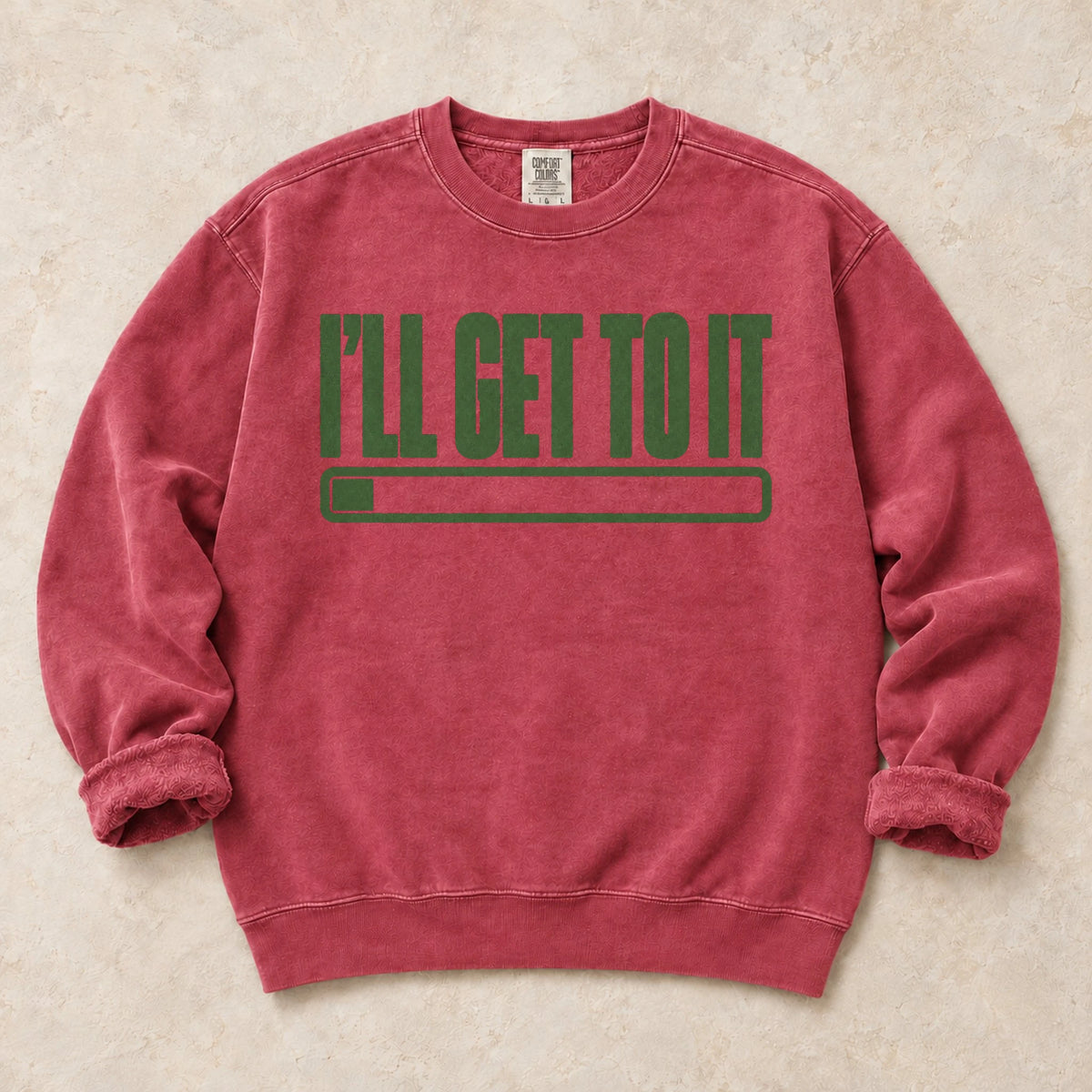 Crimson gaming sweatshirt. A barely filled progress bar promises I'll get to it.
