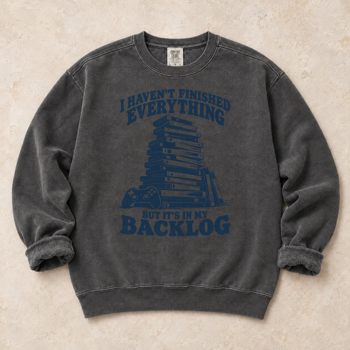 Pepper gaming sweatshirt. A game stack admits everything unfinished is in the backlog.