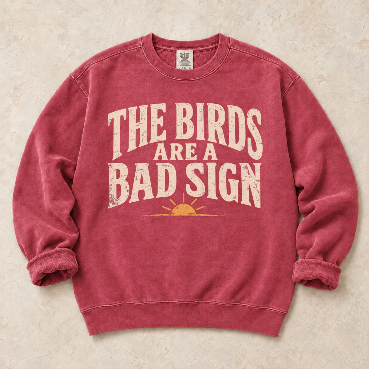 Crimson gaming sweatshirt. A sunrise warns late-night gamers the birds are a bad sign.