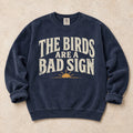True Navy gaming sweatshirt. A sunrise warns late-night gamers the birds are a bad sign.