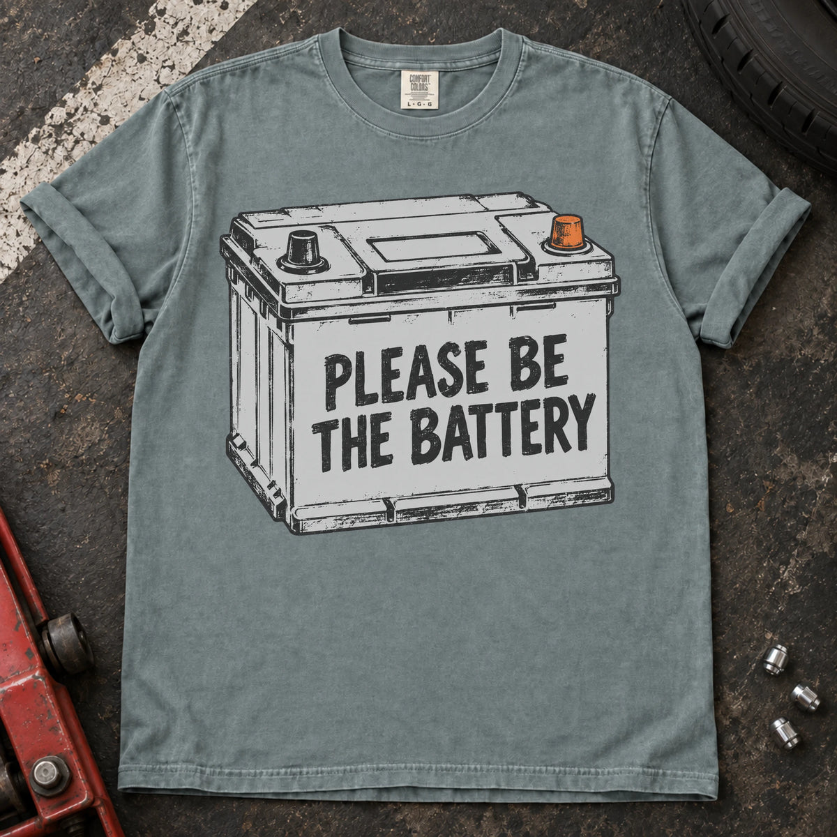 Bay car enthusiast T-shirt. A battery illustration carries the hopeful plea, please be the battery.