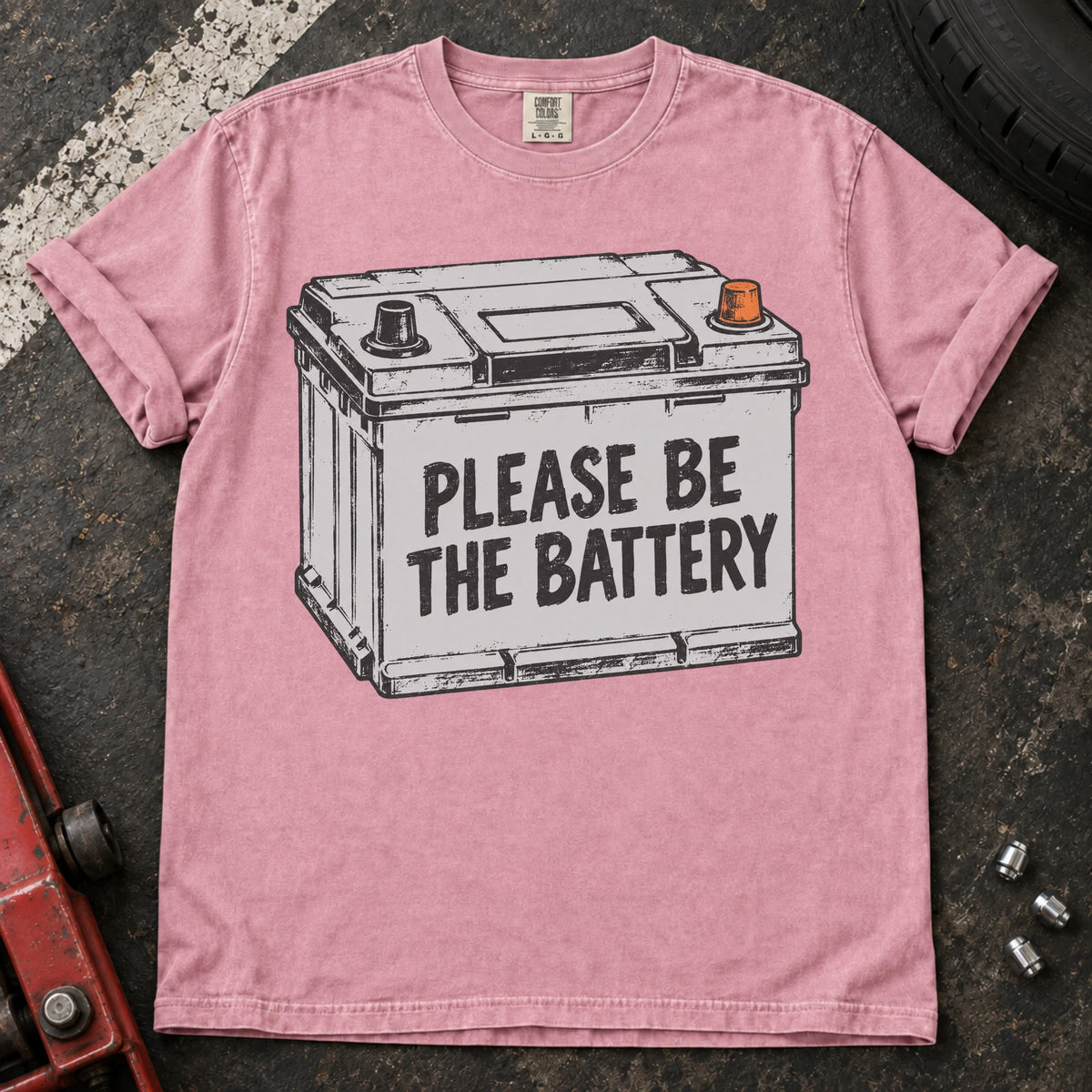 Blossom car enthusiast T-shirt. A battery illustration carries the hopeful plea, please be the battery.