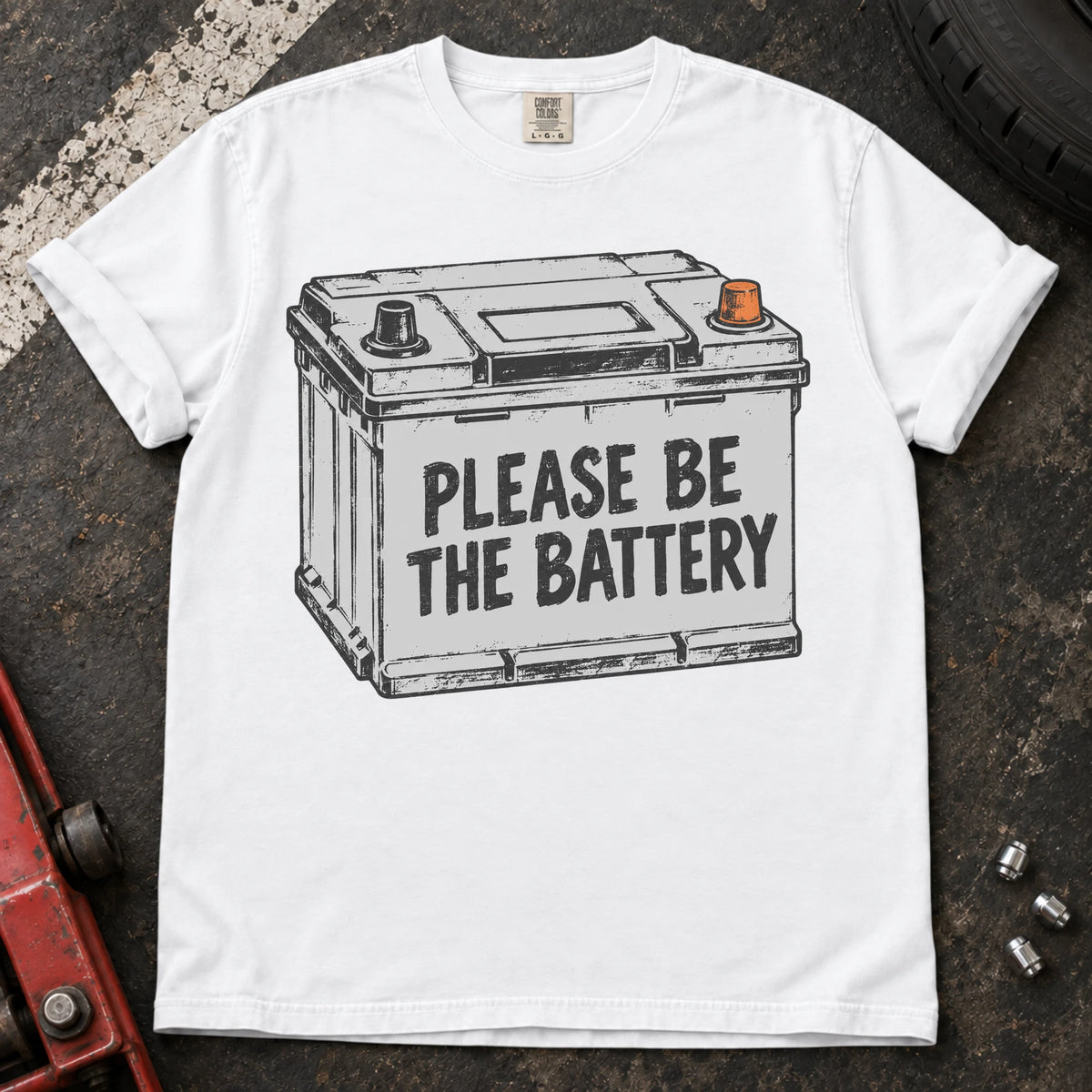 White car enthusiast T-shirt. A battery illustration carries the hopeful plea, please be the battery.