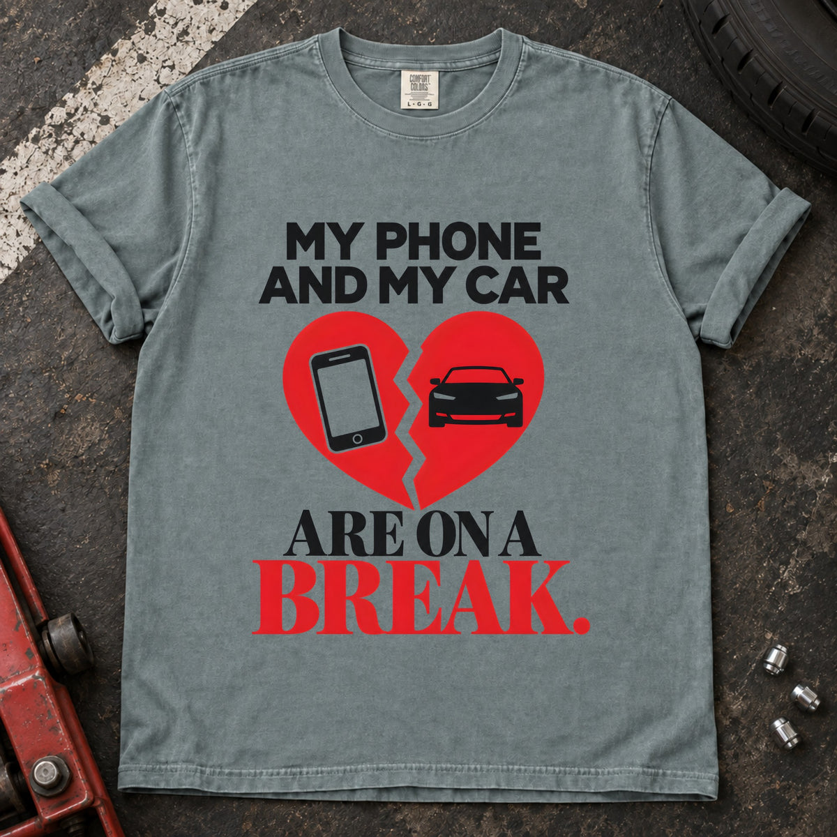 Bay T-shirt showing a phone and car on a broken heart with 'My phone and my car are on a break'.