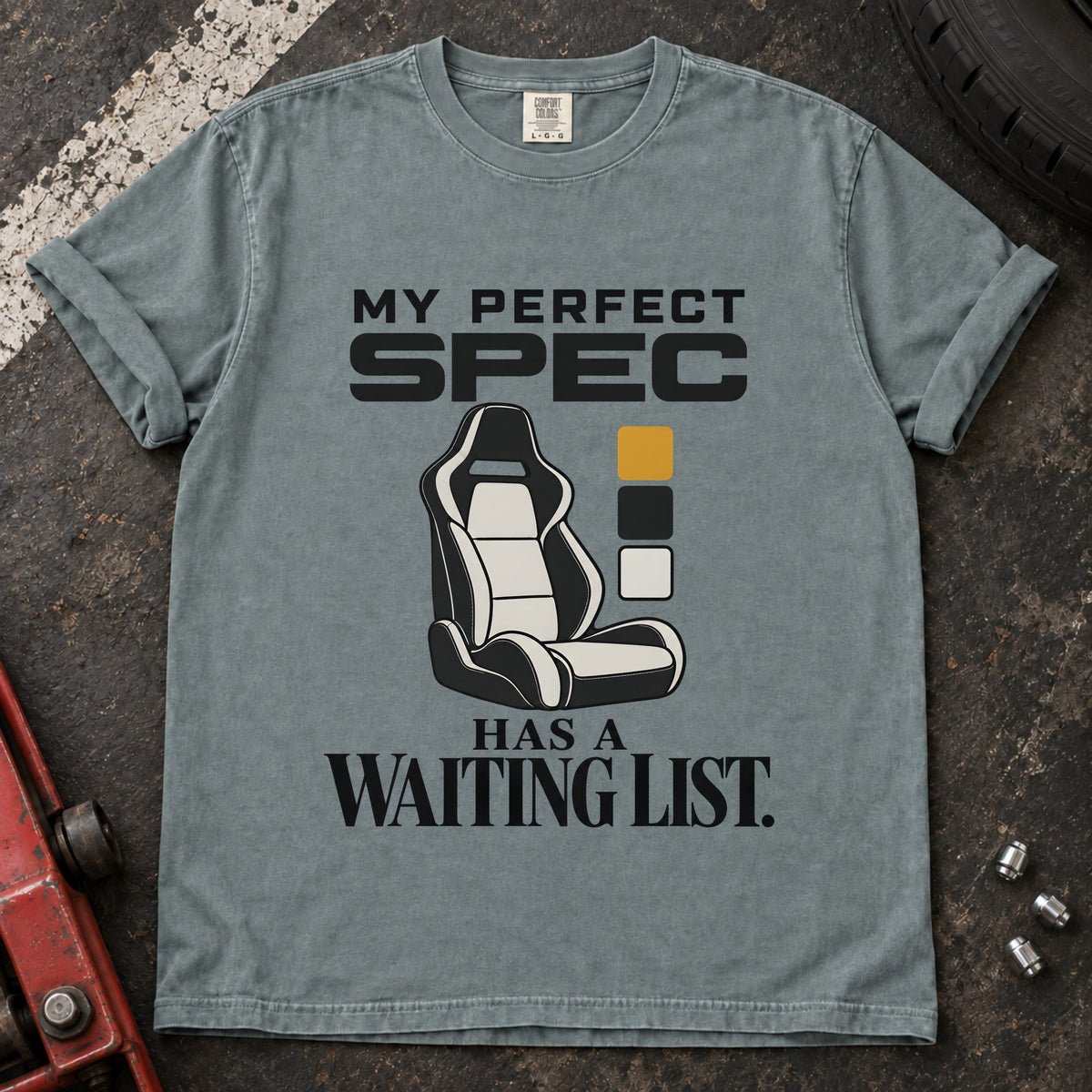 Bay T-shirt showing a car seat and color swatches with 'My perfect spec has a waiting list'.