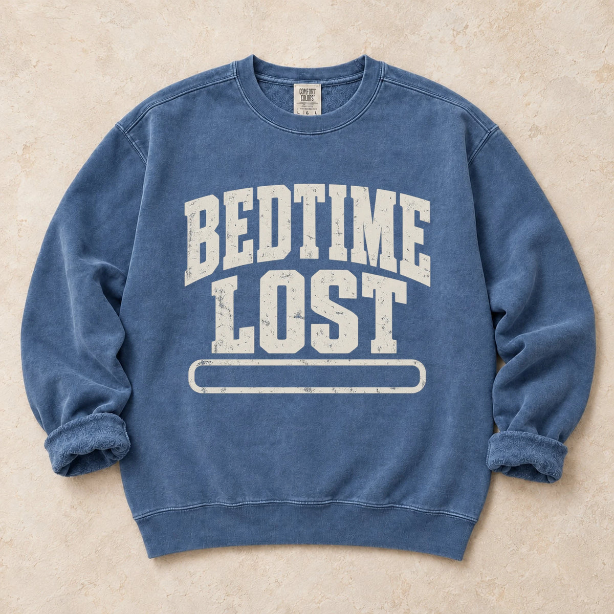 Blue Jean gaming sweatshirt. A drained progress bar admits bedtime lost.