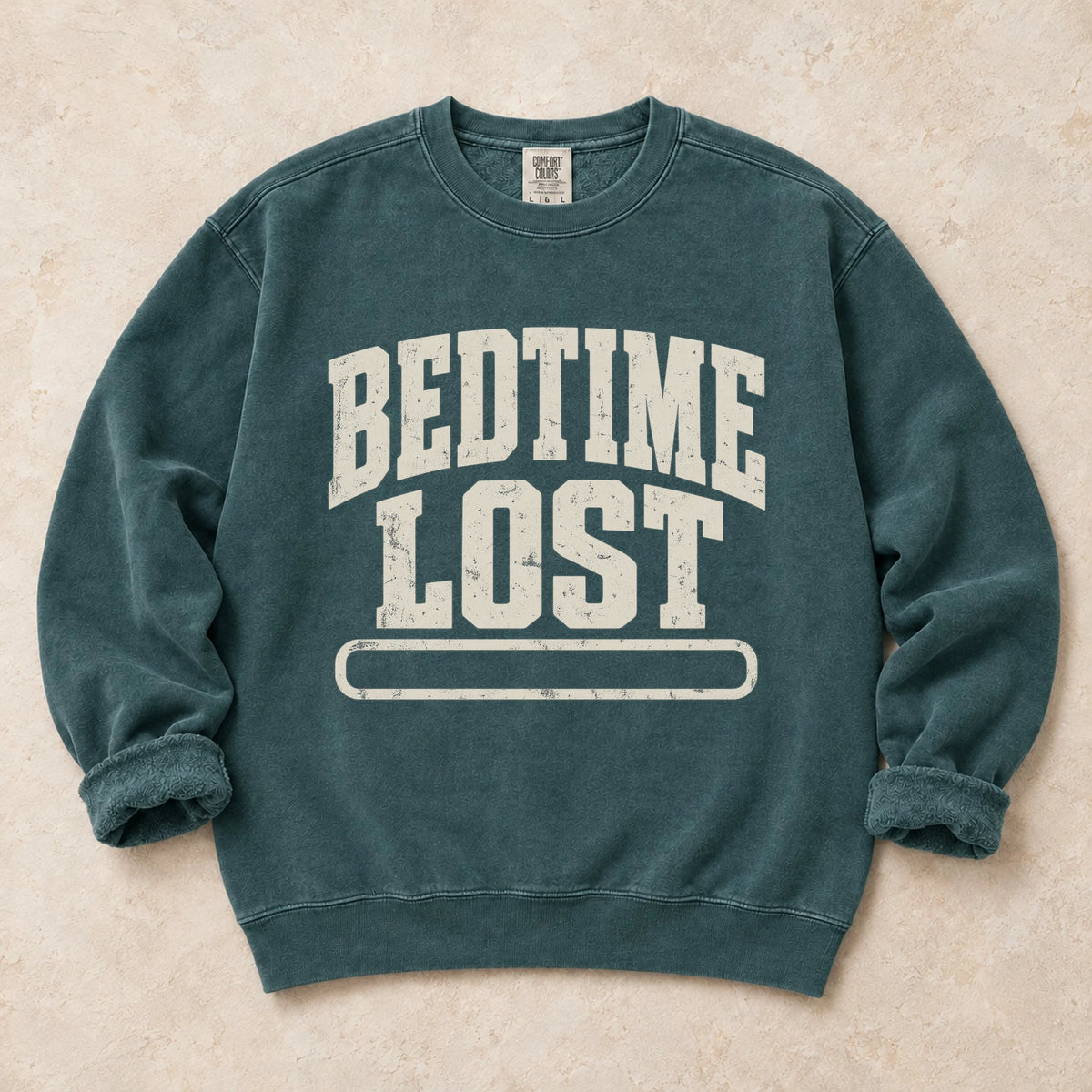 Blue Spruce gaming sweatshirt. A drained progress bar admits bedtime lost.