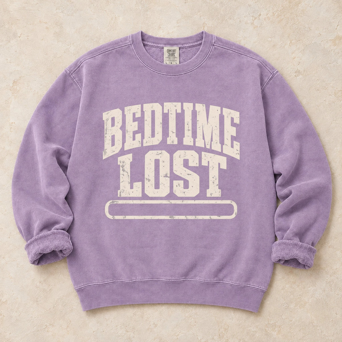Orchid gaming sweatshirt. A drained progress bar admits bedtime lost.