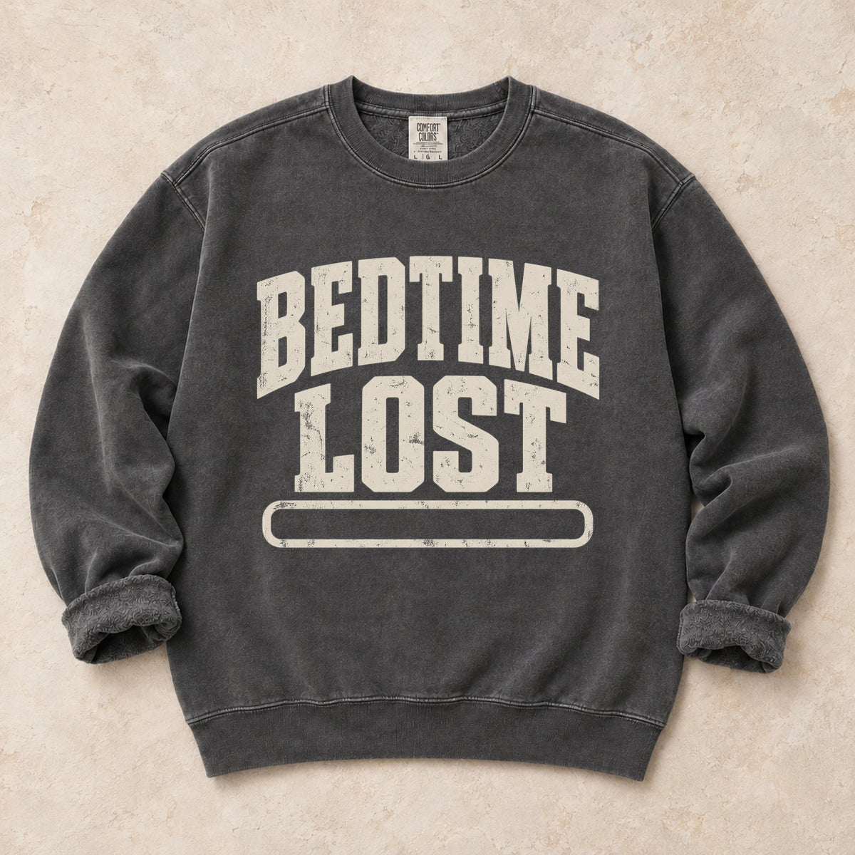 Pepper gaming sweatshirt. A drained progress bar admits bedtime lost.